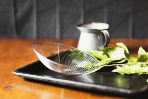 skimmer-jug-with-leaves-black-tray-table