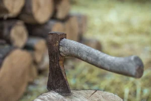 deck-stacked-logs-axe