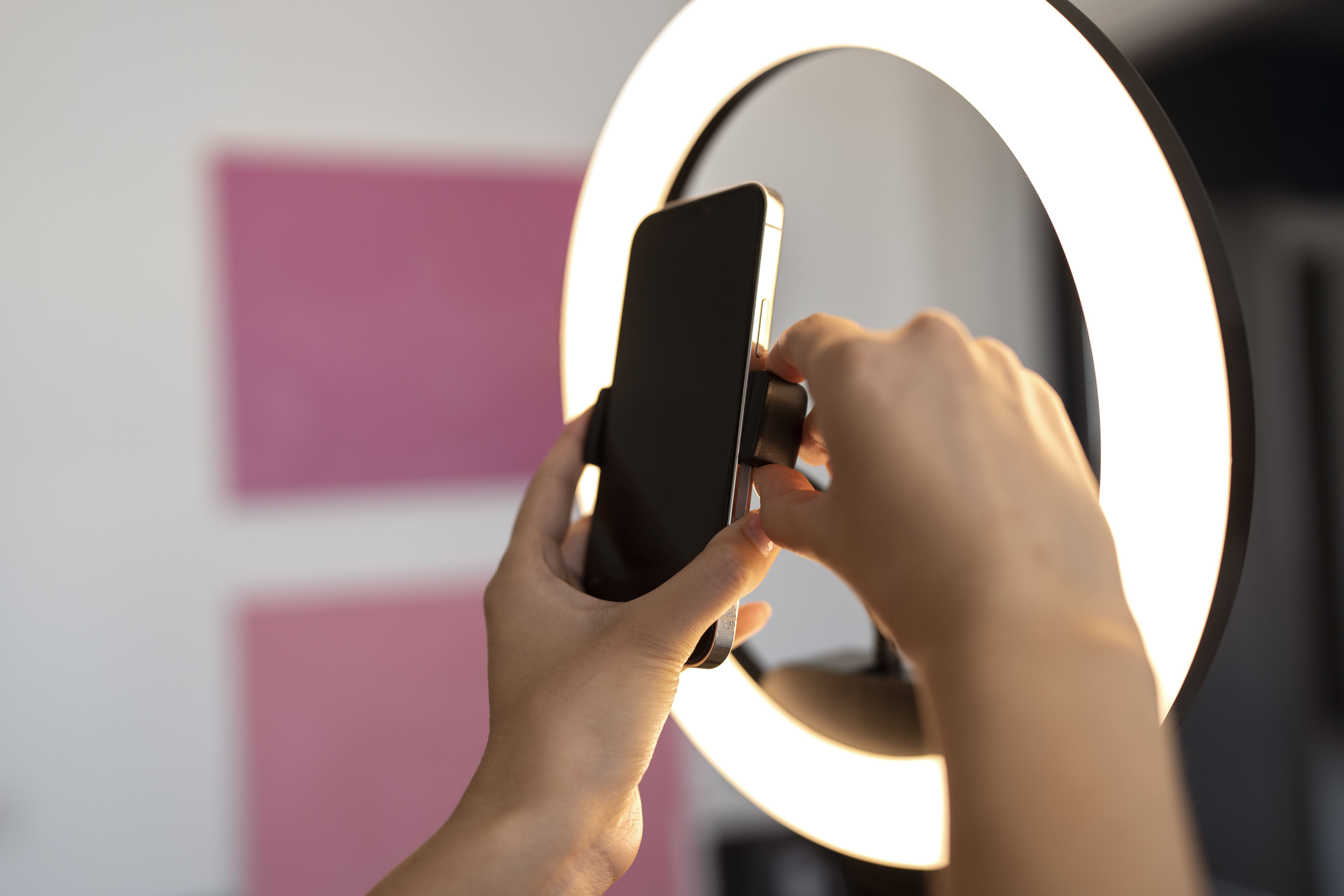 side-view-hands-holding-smartphone