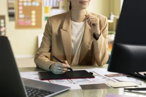 front-view-woman-working-desk