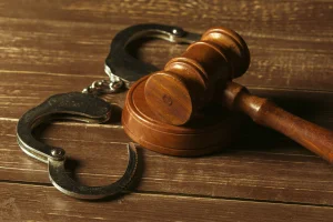 closeup-view-brown-wooden-mallet-judge (1)